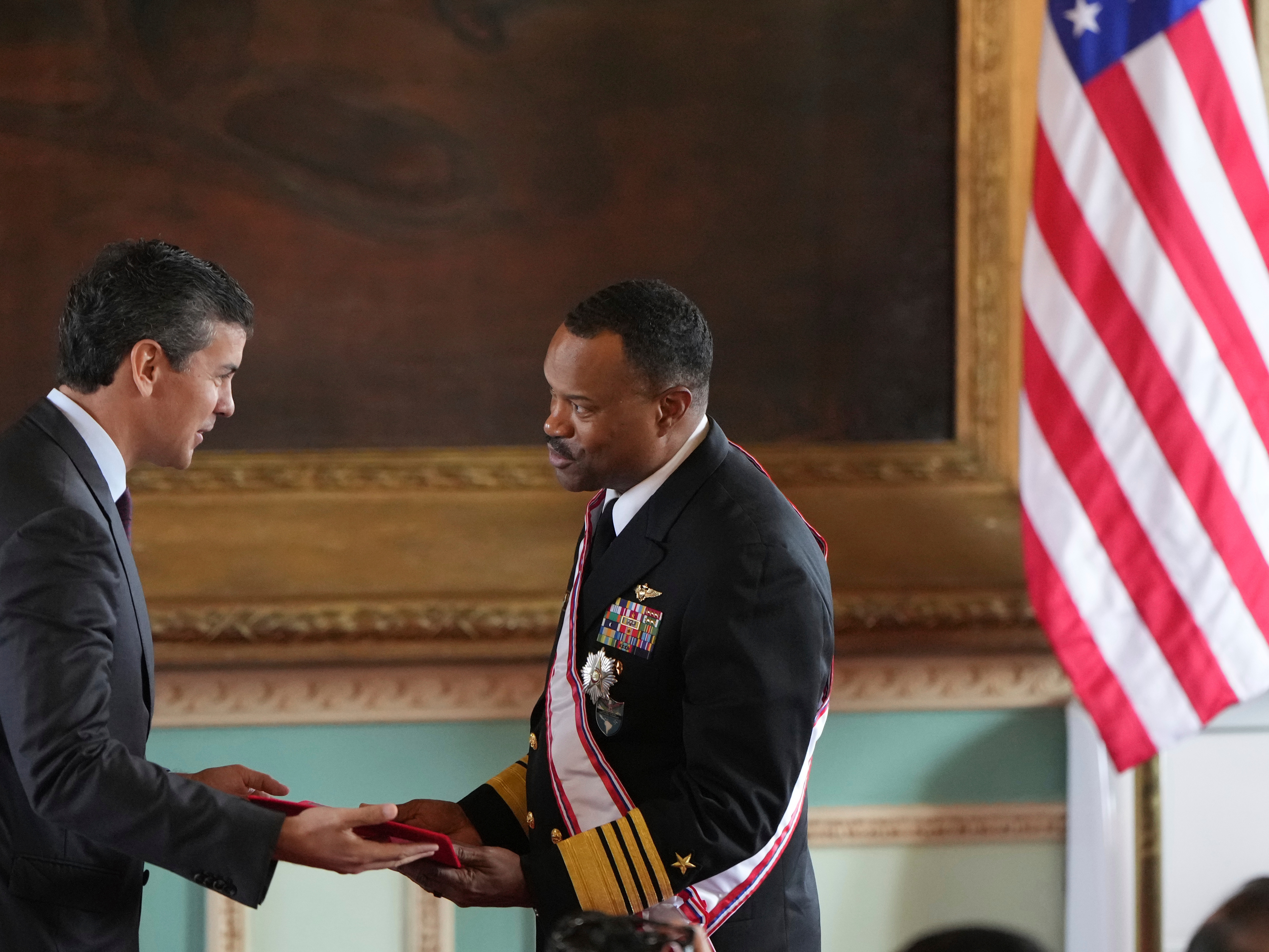 caption: Paraguay's President Santiago Peña awards the Order of Merit "Gral Div Bernardino Caballero" in the grade of "Gran Cross", to Navy Adm. Alvin Holsey, commander of U.S. Southern Command, at Government Palace in Asuncion, Paraguay, Aug. 23, 2025.