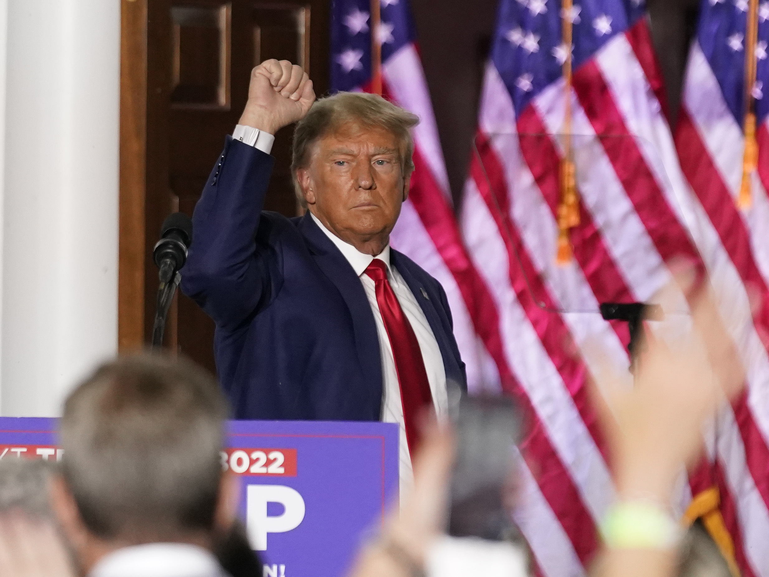 caption: Former President Donald Trump gestures after speaking at Trump National Golf Club in Bedminster, N.J., Tuesday after pleading not guilty in a Miami courtroom earlier in the day to dozens of felony counts that he hoarded classified documents and refused government demands to give them back.