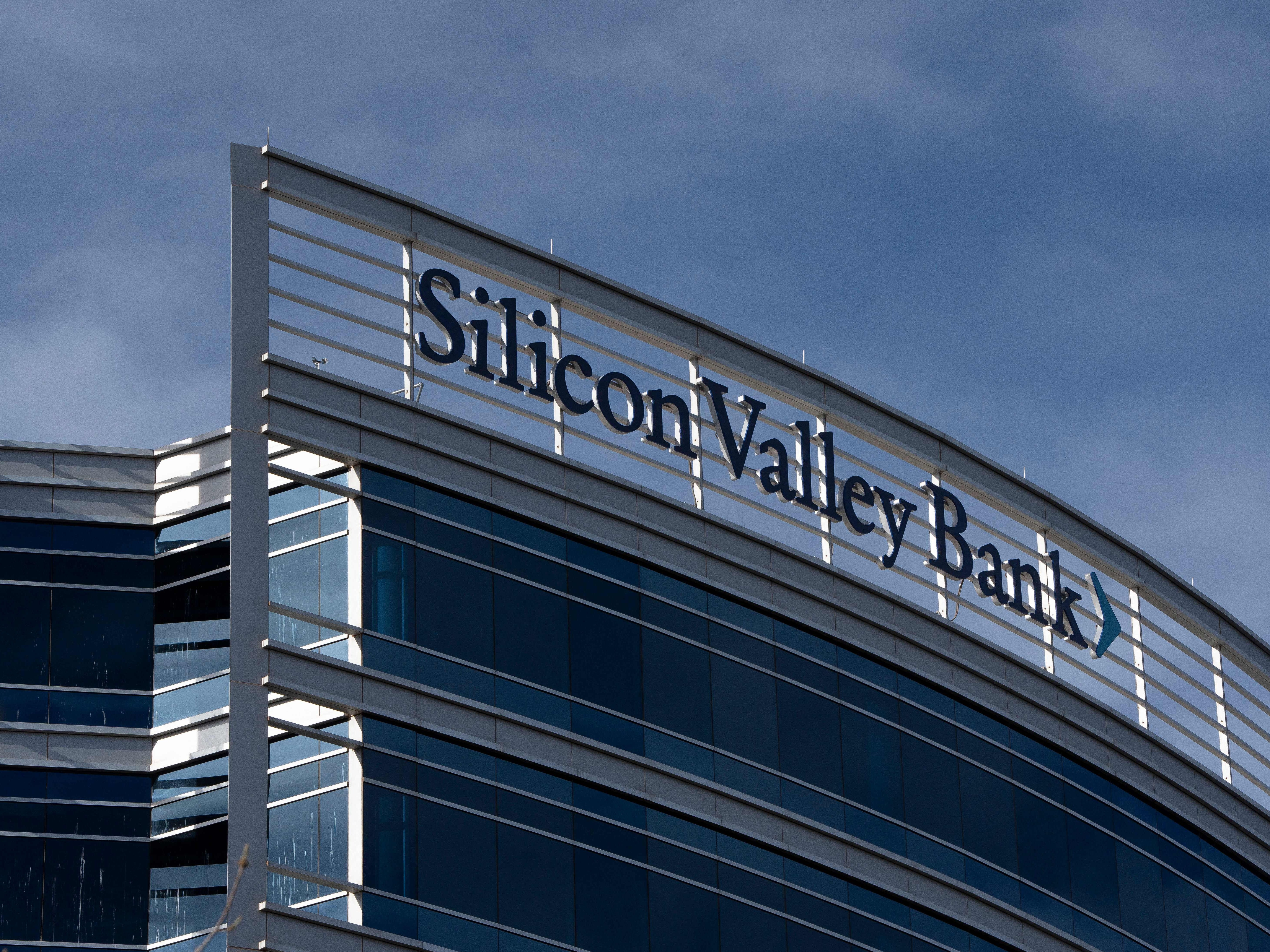 caption: A Silicon Valley Bank office is seen in Tempe, Ariz., on Tuesday. For four decades, the company catered to tech startups.