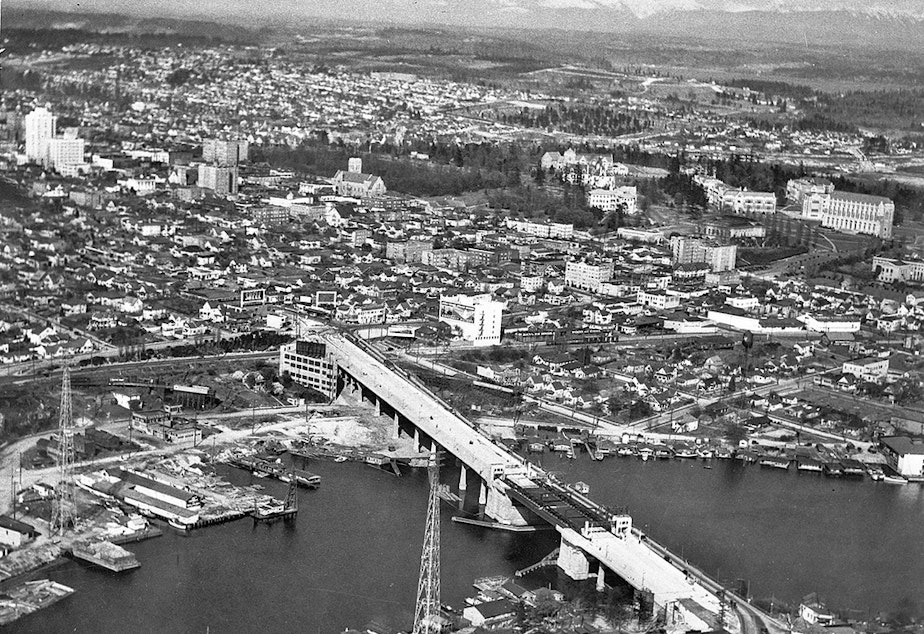 caption: In 1933, the University Bridge was under construction. In a couple of years, the district will have a Sound Transit train running through to downtown Seattle.