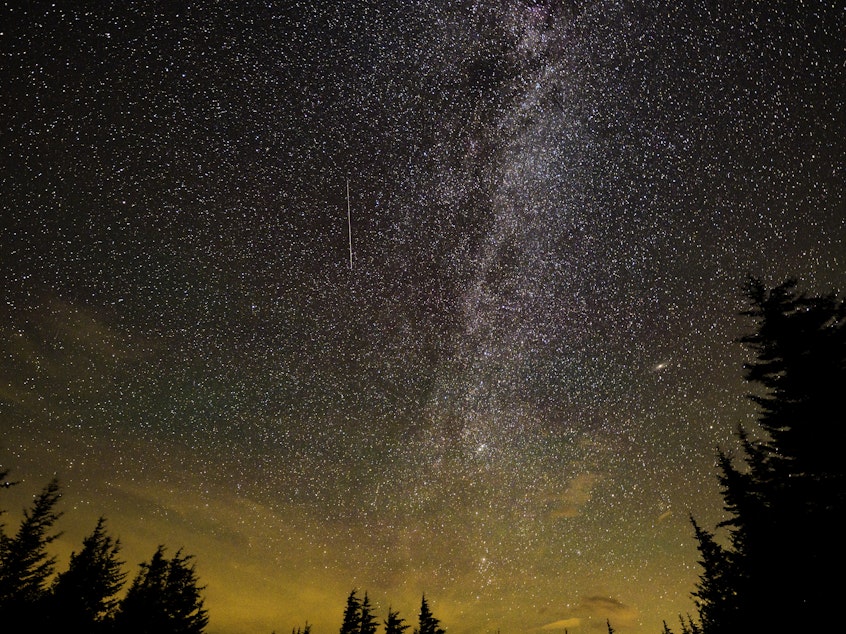 caption: In this 30 second exposure, a meteor streaks across the sky during the annual Perseid meteor shower on Aug. 10, 2021, in Spruce Knob, West Virginia.