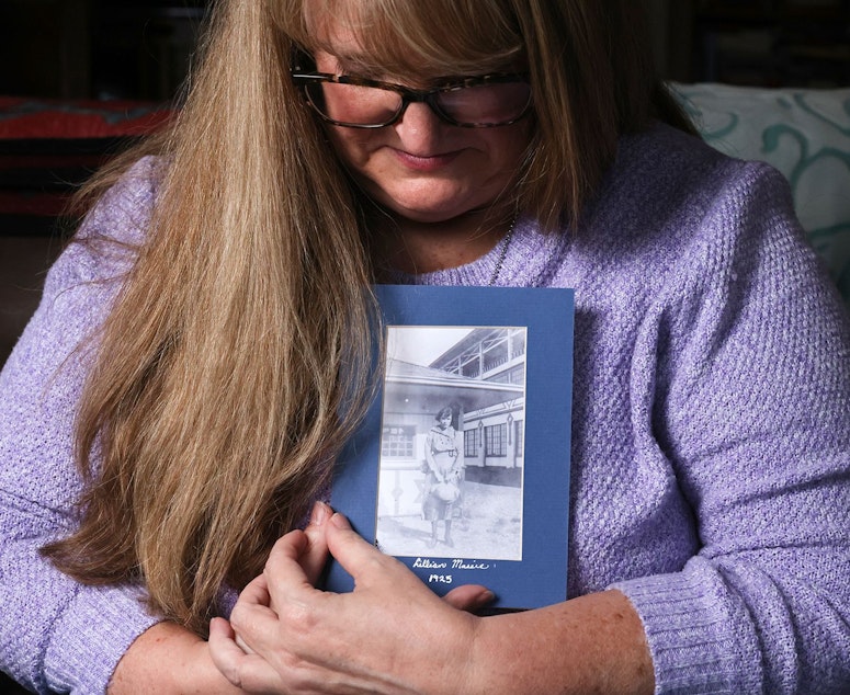 caption: Carrie Davidson holds a photo of her great-grandmother, a Northern State Hospital patient named Lillian