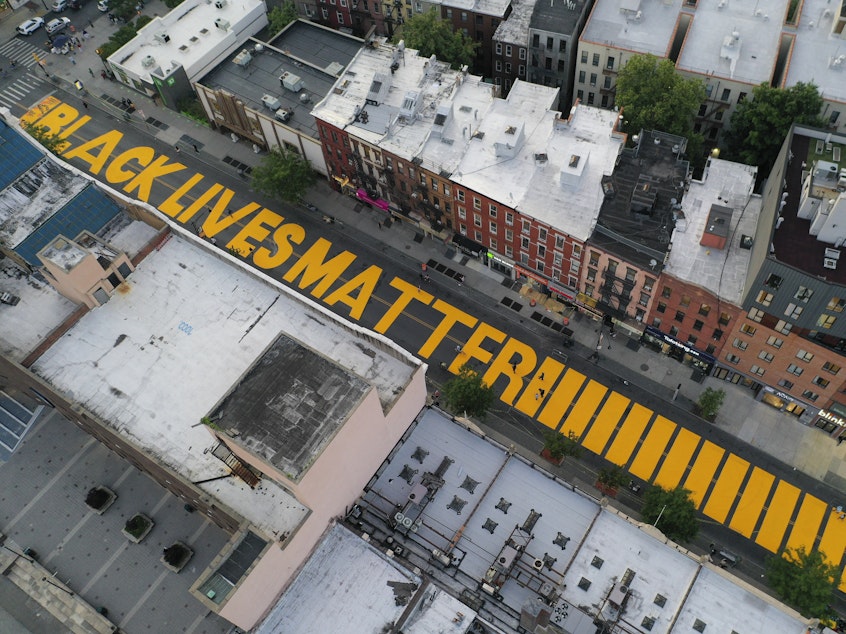 caption: "Black Lives Matter" has already been added to Fulton Street in Brooklyn. Manhattan may be next up in New York City, but President Trump has denounced a plan to have the words painted on Fifth Avenue.