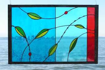 caption: Joby Shimomura's stained glass work at Alki Beach in West Seattle.