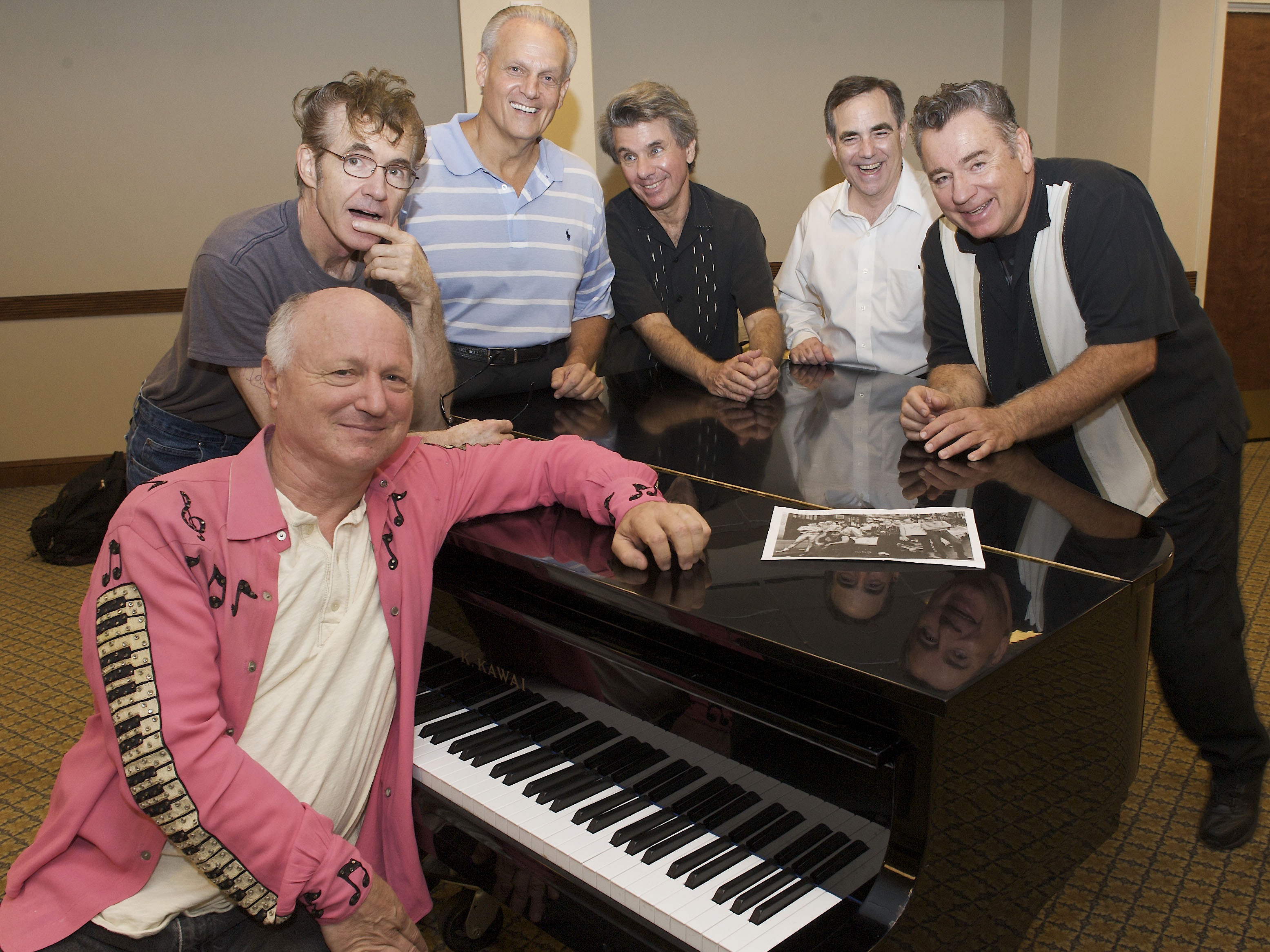 caption: The doo-wop group Sha Na Na poses during a rehearsal for their special performance to mark the 75th anniversary of Hofstra University in Melville, N.Y. From left are Screamin' Scott Simon, Donny York, David Garrett, Elliot Cahn, Robert Leonard and Jocko Marcellino.