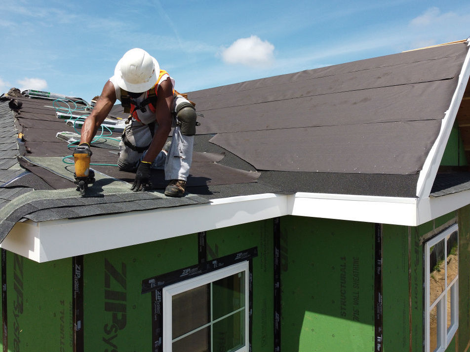 caption: Workers typically rely on plastic hard hat styles designed in the 1960s. But newer technology does a better job at protecting brains, especially from oblique impact caused by falls.