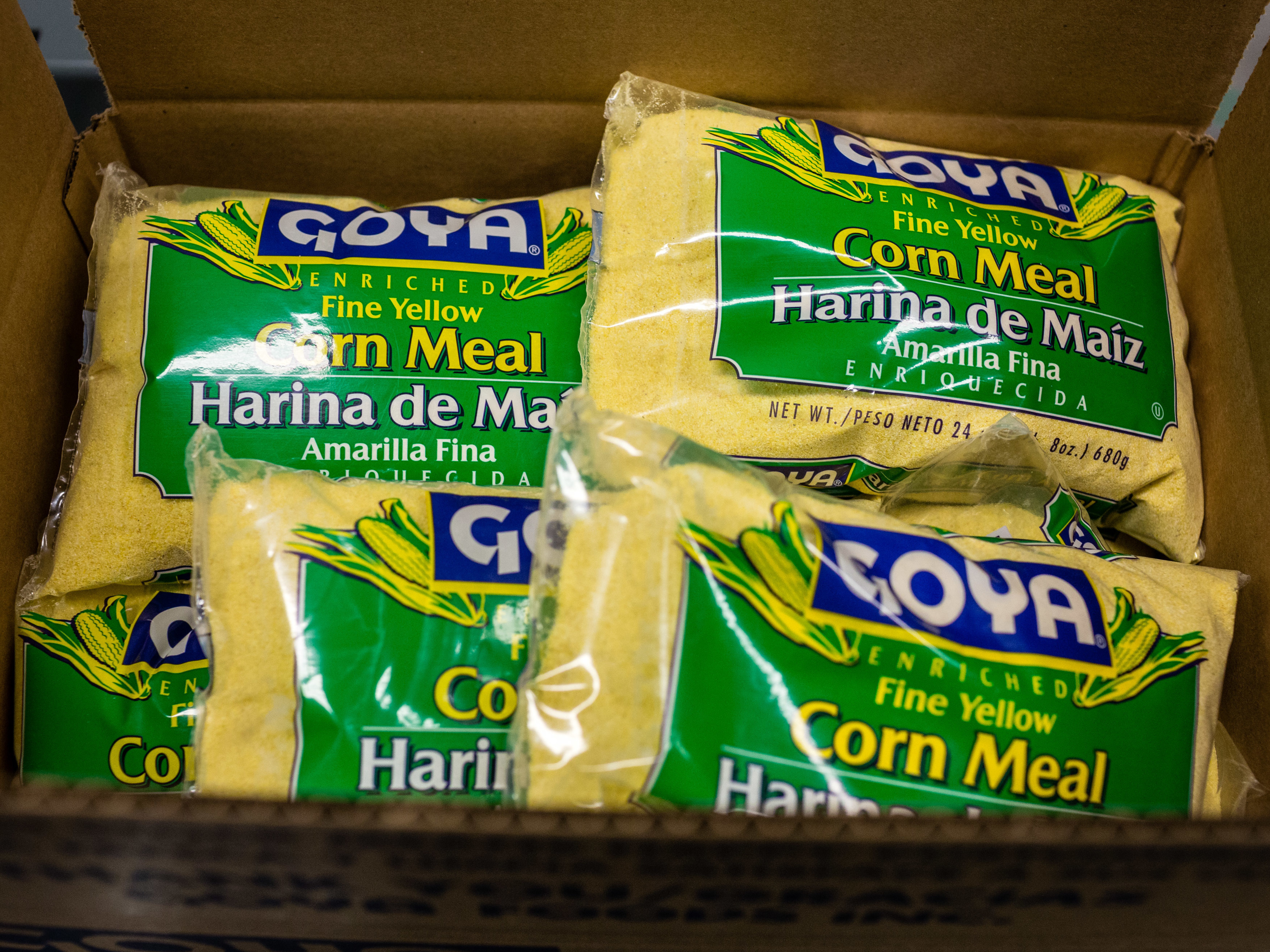 caption: Packages of Goya Foods Inc. corn meal sit in a box at the company's production facility in Secaucus, N.J., in 2018.