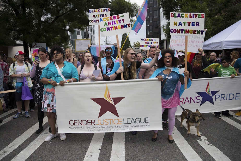 caption: The Trans Pride Seattle march begins on Broadway Street on Friday, June 22, 2018, near Cal Anderson Park in Capitol Hill.