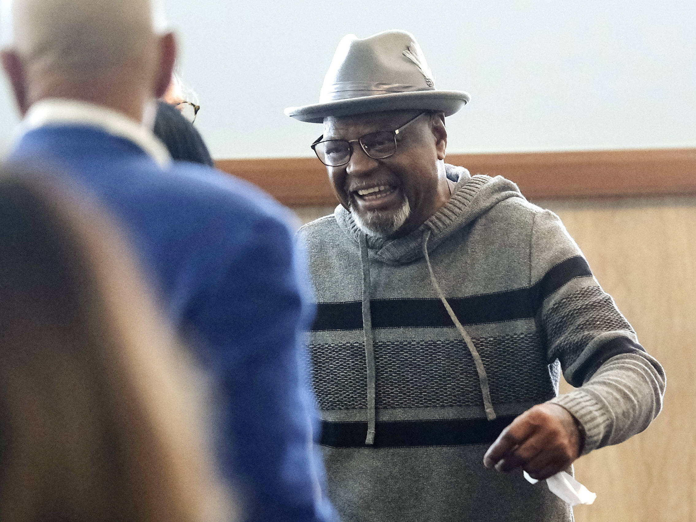 caption: Glynn Simmons reacts as he leaves court after a judge ruled to approve his "actual innocence" claim during a hearing at the Oklahoma County Courthouse on Tuesday, Dec. 19, 2023, in Oklahoma City, Okla.