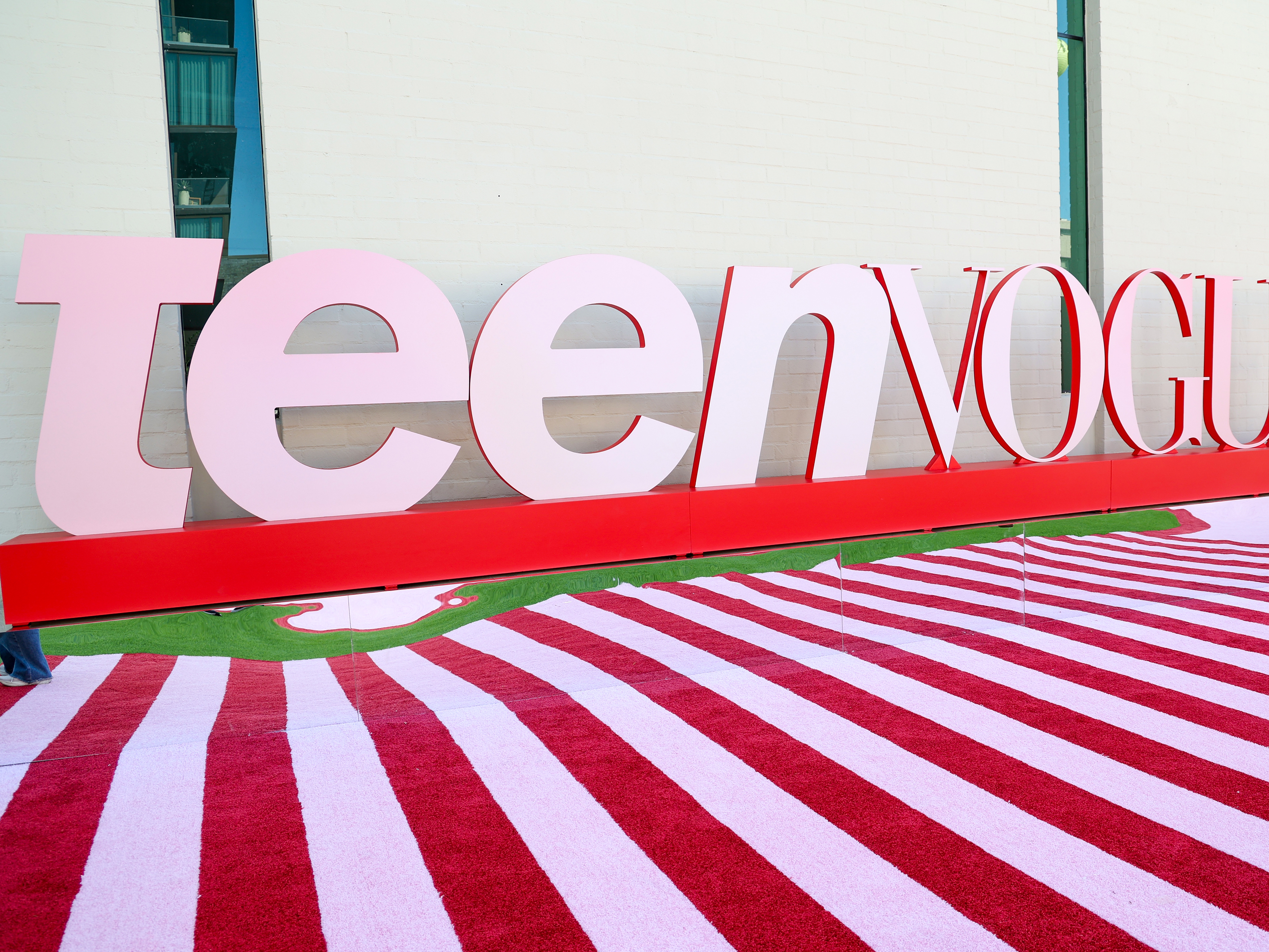 caption: Teen Vogue signage is seen during the 2025 Teen Vogue Summit at NYA WEST on Sept. 20, 2025 in Los Angeles.