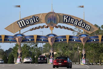 caption: Cars line-up to enter Walt Disney World on February 08, 2023 in Orlando, Florida.