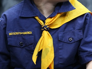 caption: A boy scout in uniform.