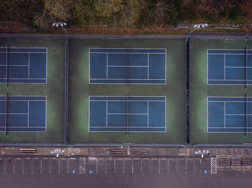caption: The Lower Woodland Tennis Courts are shown on Sunday, April 5, 2020, in Seattle.