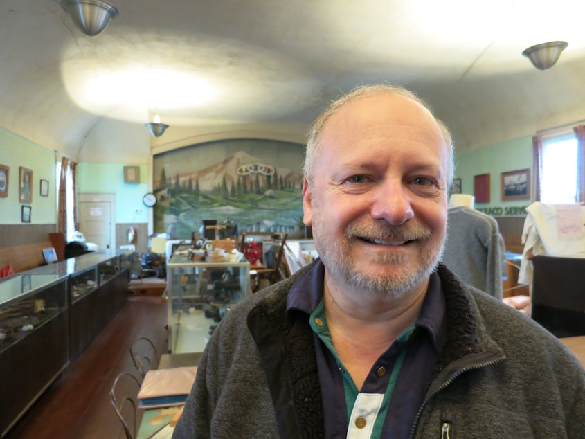 caption: Richard Kennedy edited a book of Des Moines-area history. He poses inside the Des Moines Historical Society's museum. 