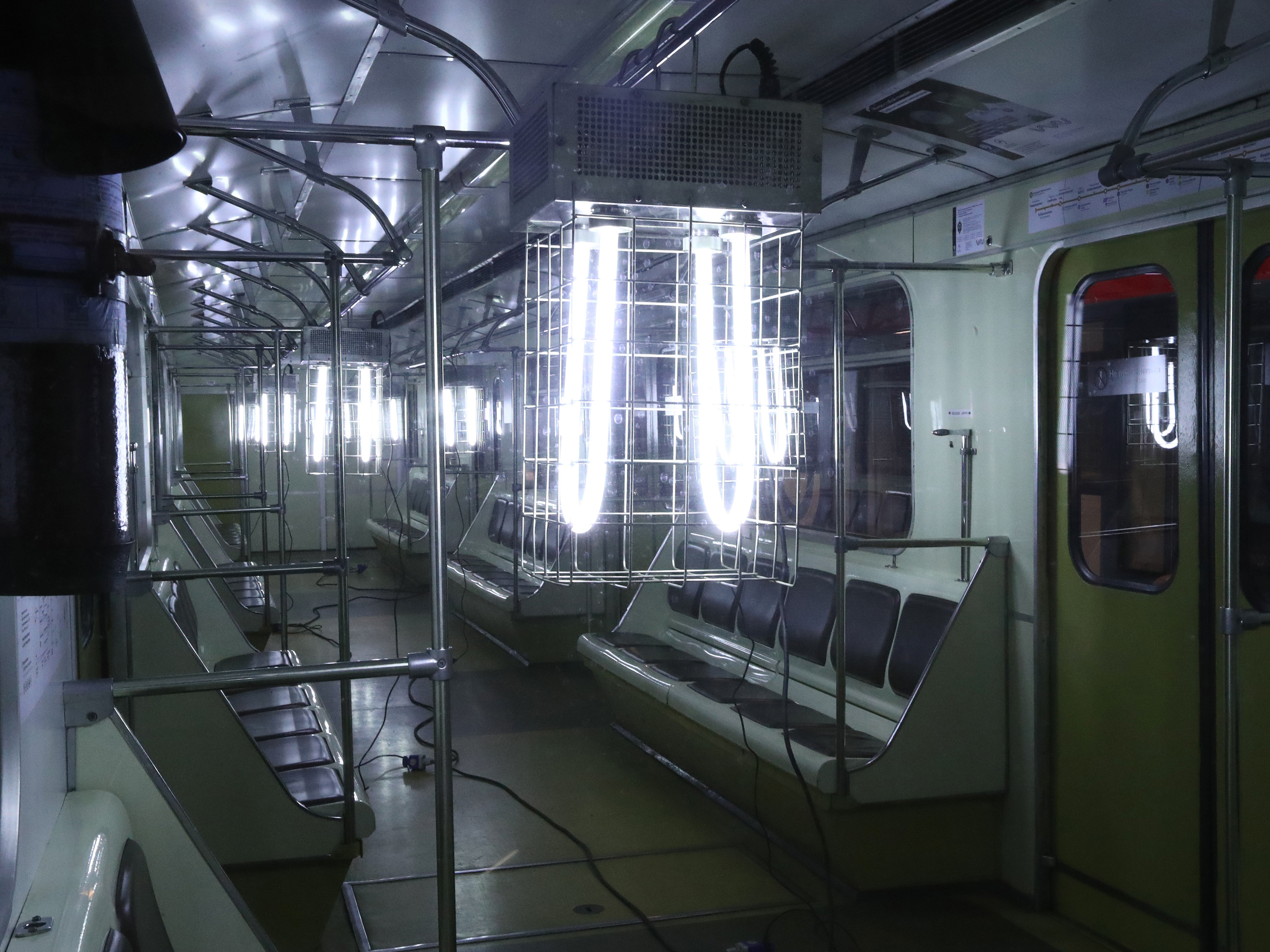 caption: A quartz UV germicidal lamp is used to disinfect a train at the Sviblovo Depot of the Moscow Underground (Metro).