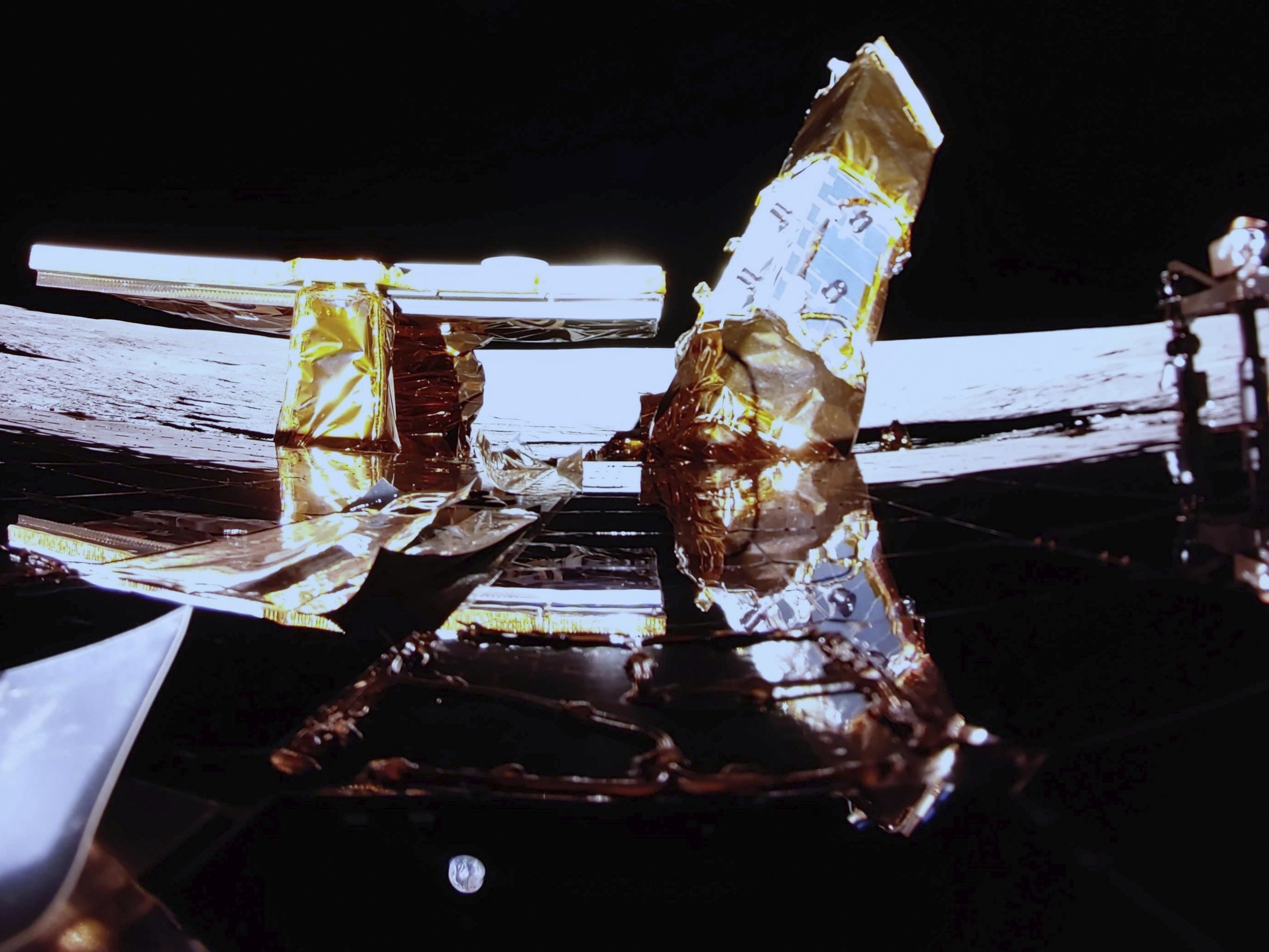 caption: Private lunar lander Blue Ghost is seen after touching down on the moon on March 2.