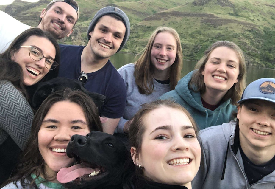 caption: {From bottom left] Natalie Newcomb celebrates graduating with her dog, Pulitzer, and friends Katie Collins, Taner Schiller, [from top left] Tessa Czech, Ruby the dog, Lucas Mason, Colby Enebrad, Katie Arrasmith, and Paige Campbell. 