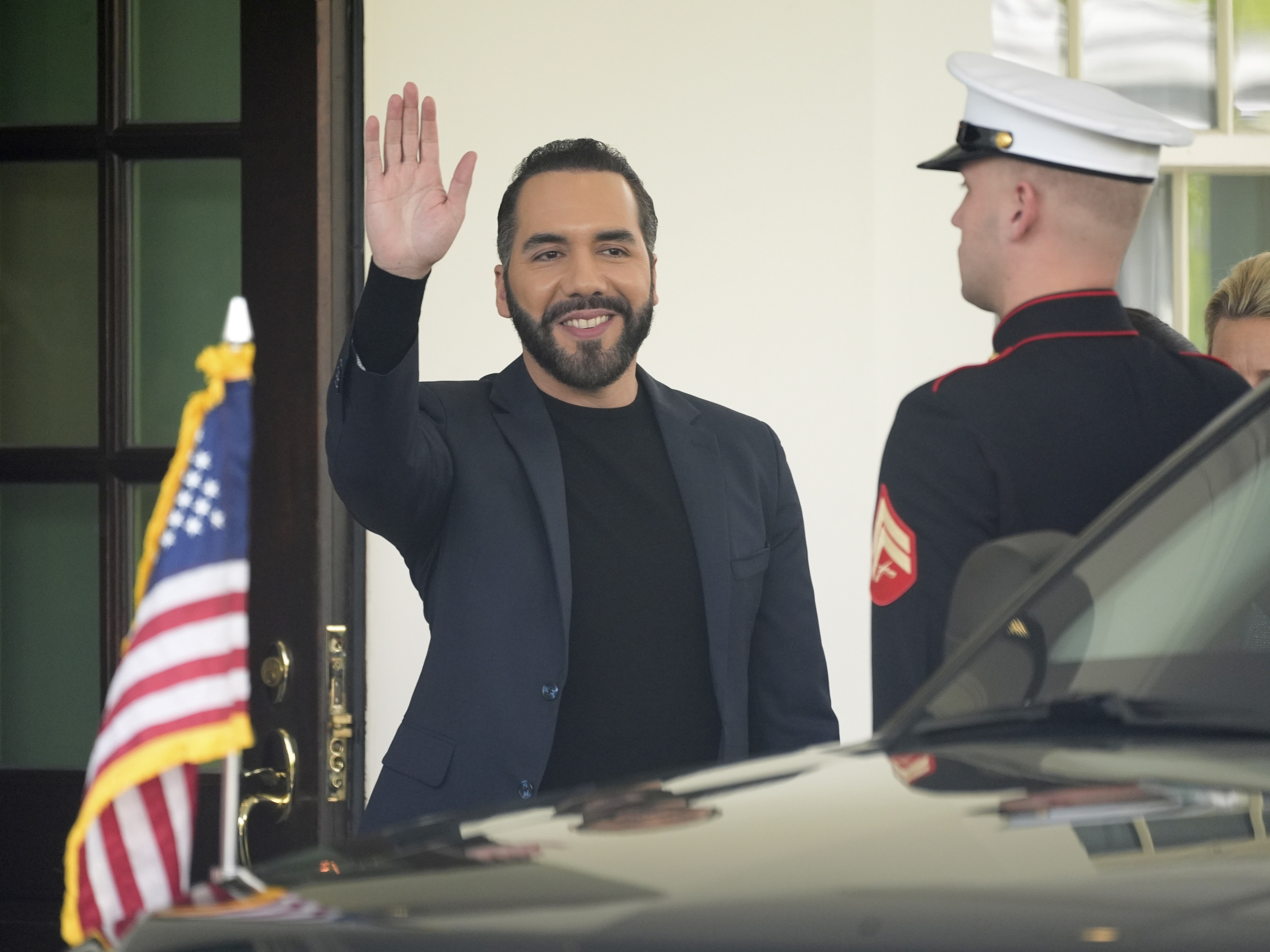 caption: El Salvador's President Nayib Bukele waves as he departs following a meeting at the White House with President Donald Trump, Monday, April 14, 2025, in Washington.