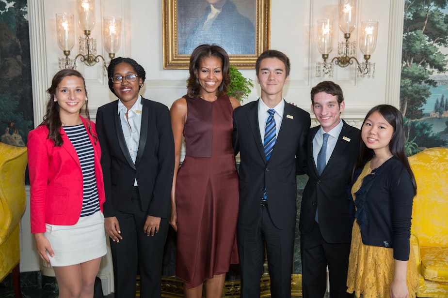 caption: First Lady Michelle Obama with the 2013 National Student Poets (from left: Michaela Coplen; Sojourner Ahebee, Nathan Cummings, Louis Lafair, and Aline Dolinh) in the Diplomatic Reception Room of the White House, Sept. 20, 2013.