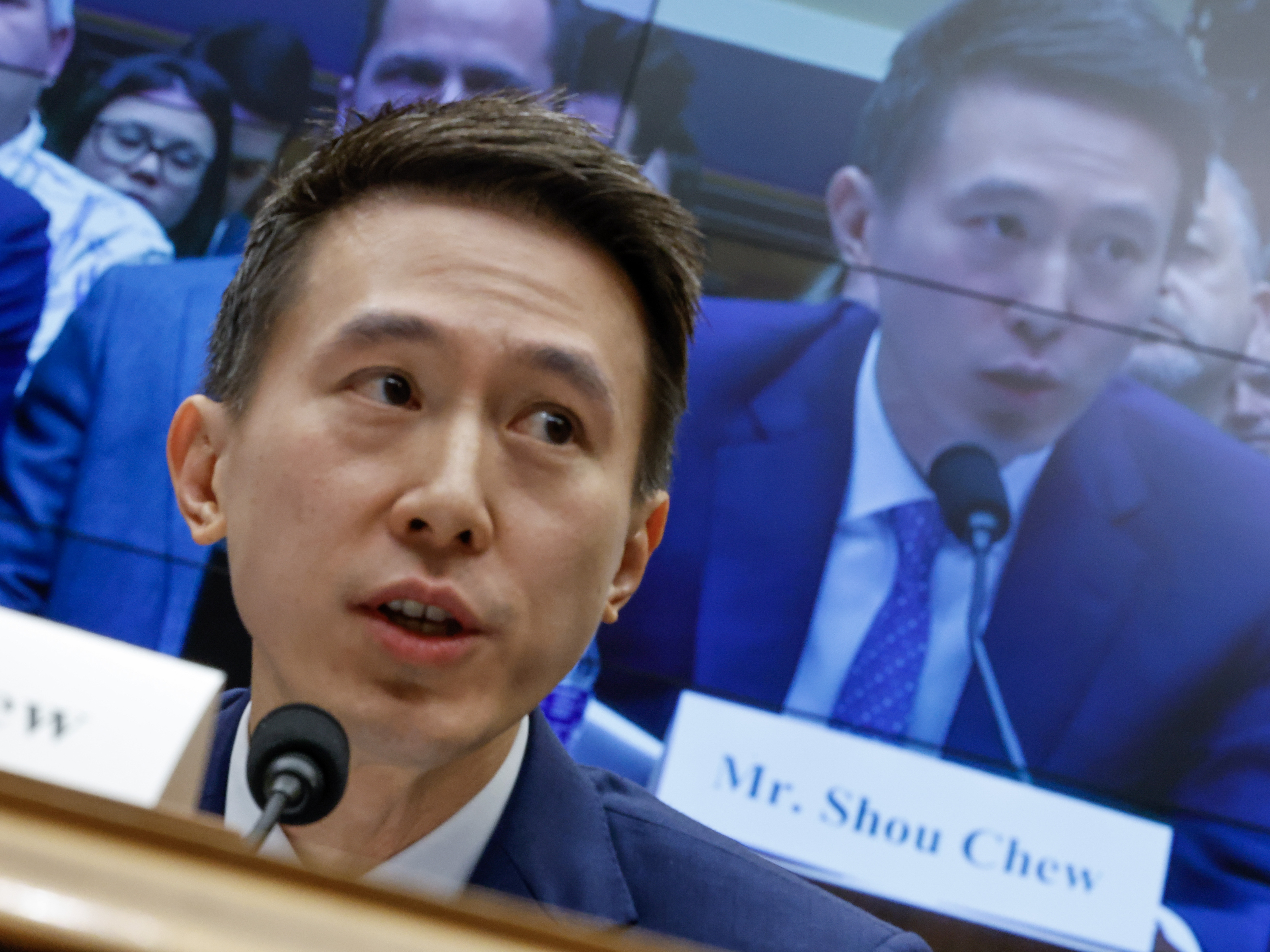 caption: TikTok CEO Shou Zi Chew testifies before the House Energy and Commerce Committee on Capitol Hill on March 23, 2023. The hearing was a rare opportunity for lawmakers to question the leader of the short-form social media video app about the company's relationship with its Chinese owner, ByteDance, and how they handle users' sensitive personal data.