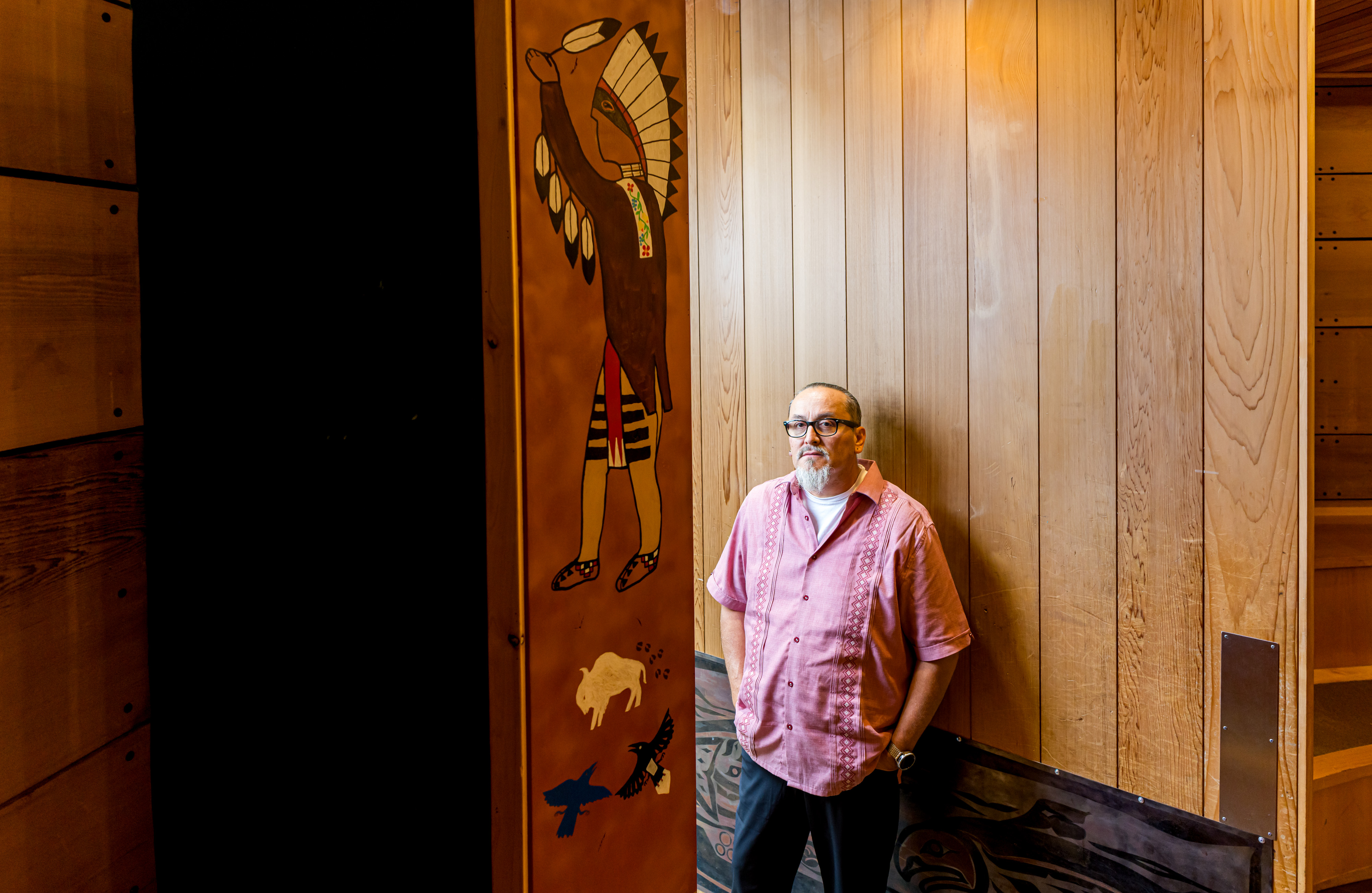 caption: Derrick Belgarde says many of his clients at the Chief Seattle Club, who are called relatives, are often dealing with the same issues as their parents, like homelessness after interacting with the foster care system.