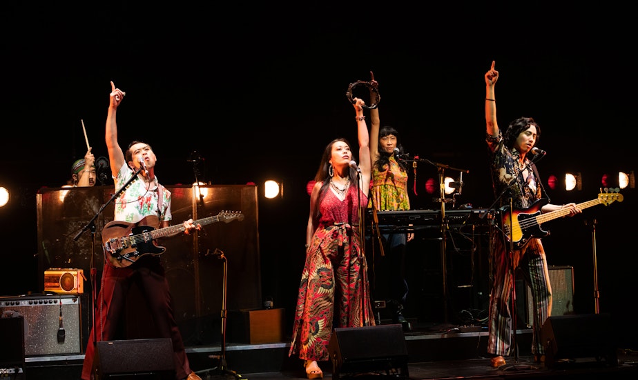 caption: Abraham Kim, Joe Ngo, Brooke Ishibashi, Jane Lui, and Tim Liu in Cambodian Rock Band at Arena Stage at the Mead Center for American Theater. 