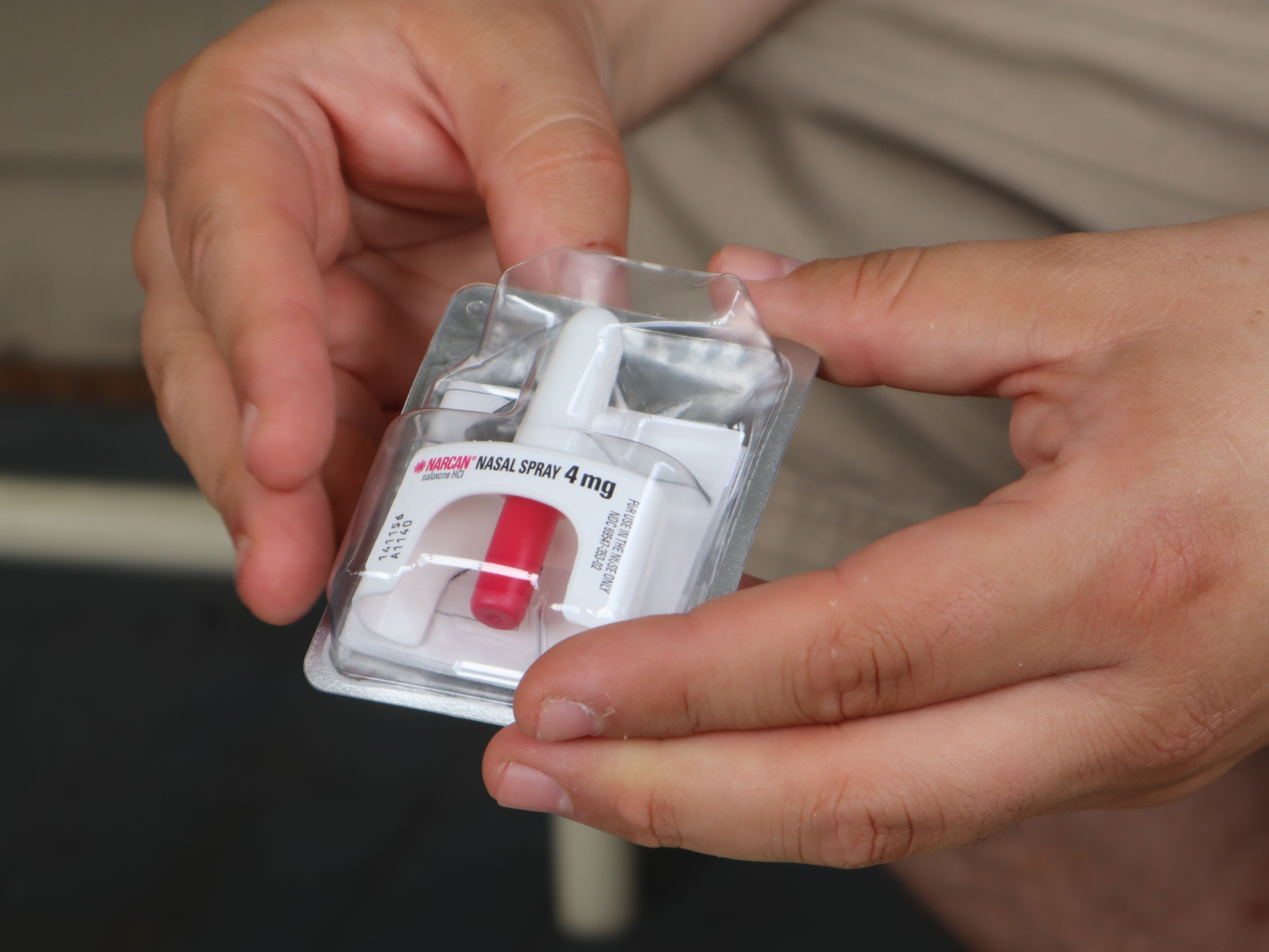 caption: The opioid overdose reversal drug Narcan (shown here at the Unitarian Universalist Congregation of Charleston in Charleston, W.Va., on Sept. 6, 2022) has been approved for over-the-counter sales.