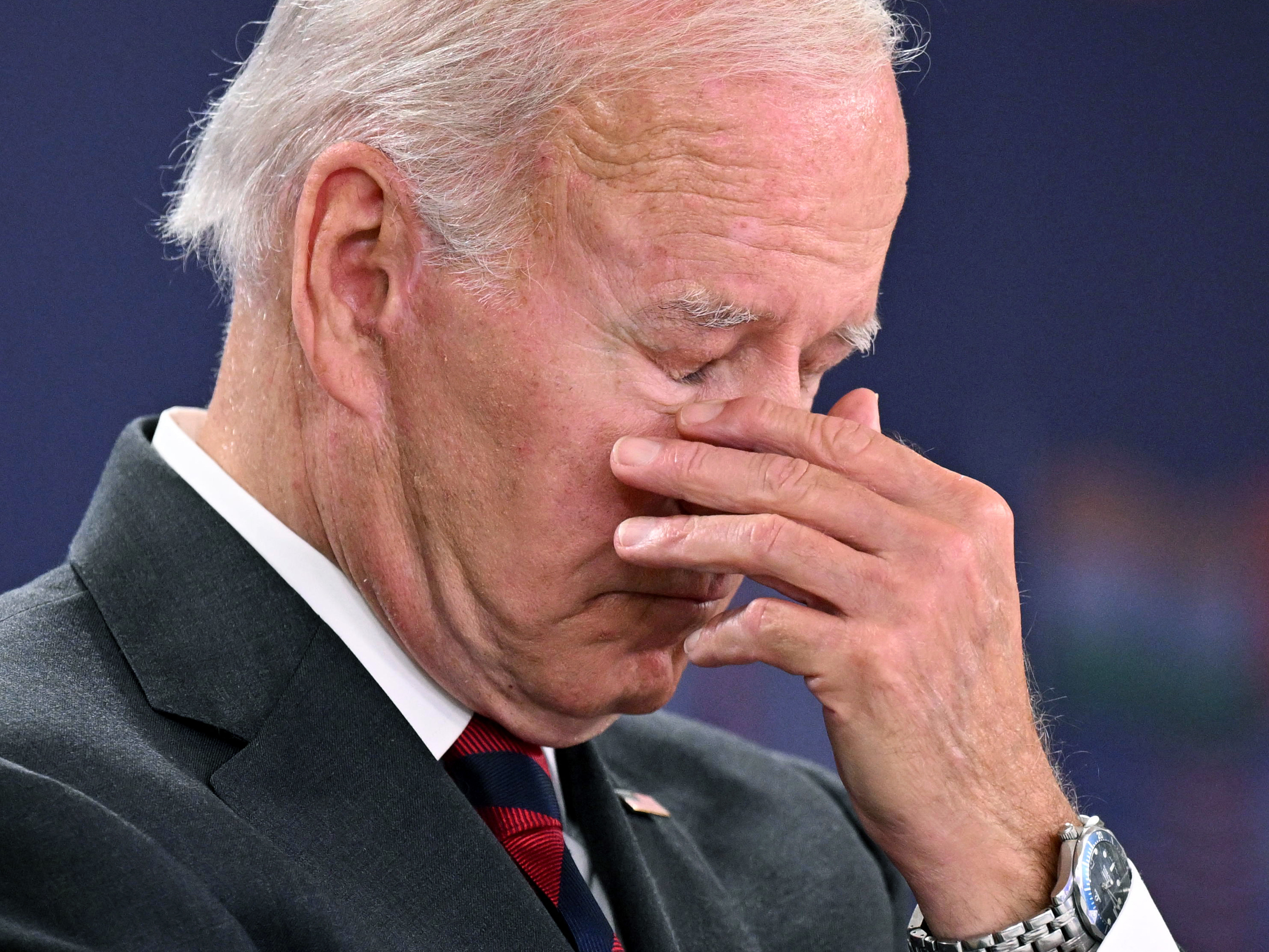 caption: President Biden is facing political trouble domestically, particularly from his own party.