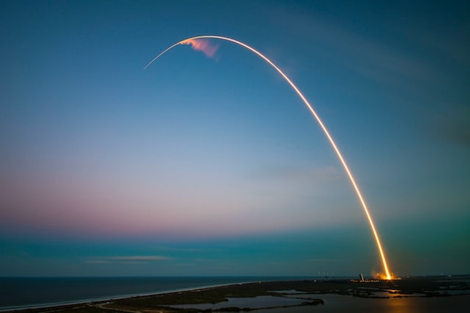 caption: A SpaceX rocket launches from the Cape Canaveral Air Force Station in Florida.  