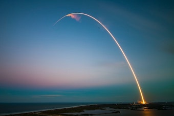 caption: A SpaceX rocket launches from the Cape Canaveral Air Force Station in Florida.  