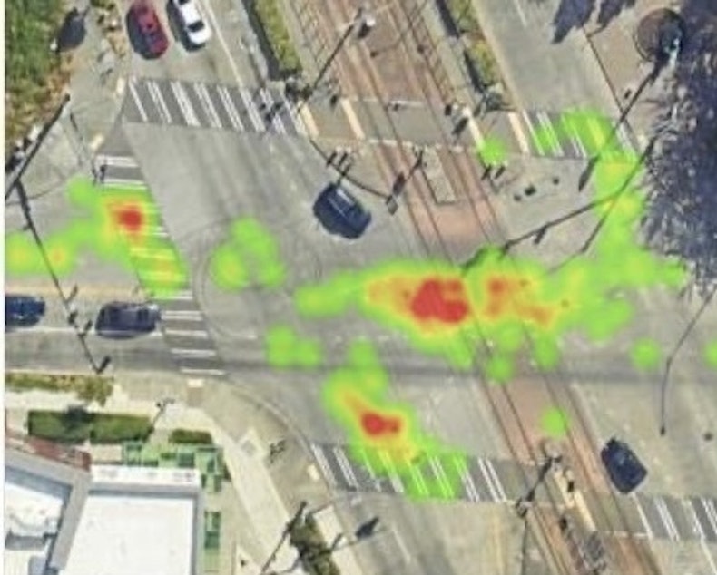 caption: Heat map highlighting frequent near-miss zones in a Seattle intersection