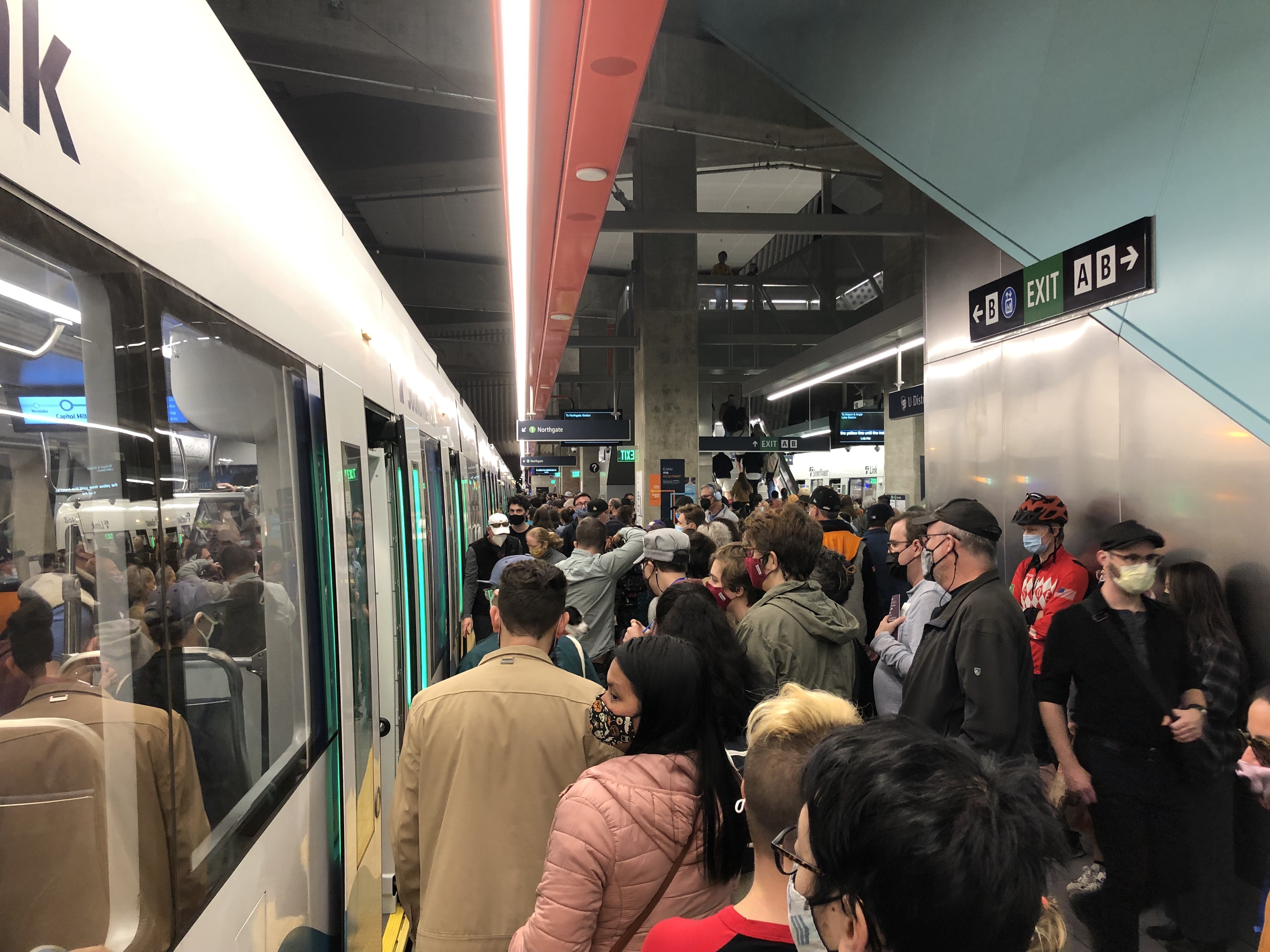 caption: Anticipation and ridership were intense as the U District station opened to the public Oct. 2, 2021. 