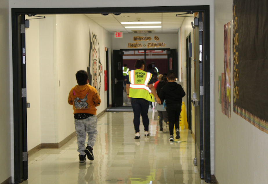 caption: Students head to class in the Marysville School District which neighbors the Tulalip Tribes.