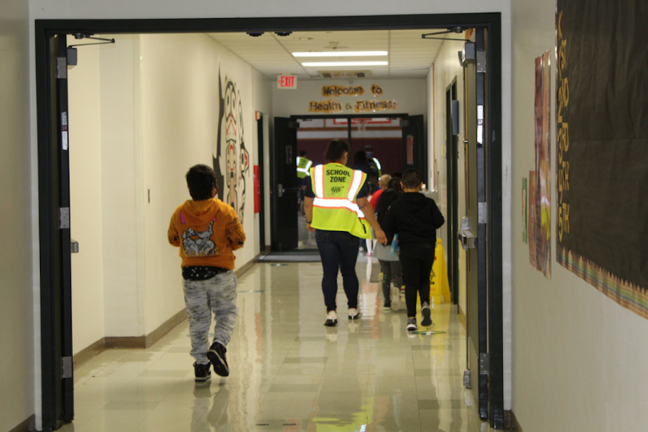 caption: Students head to class in the Marysville School District which neighbors the Tulalip Tribes.