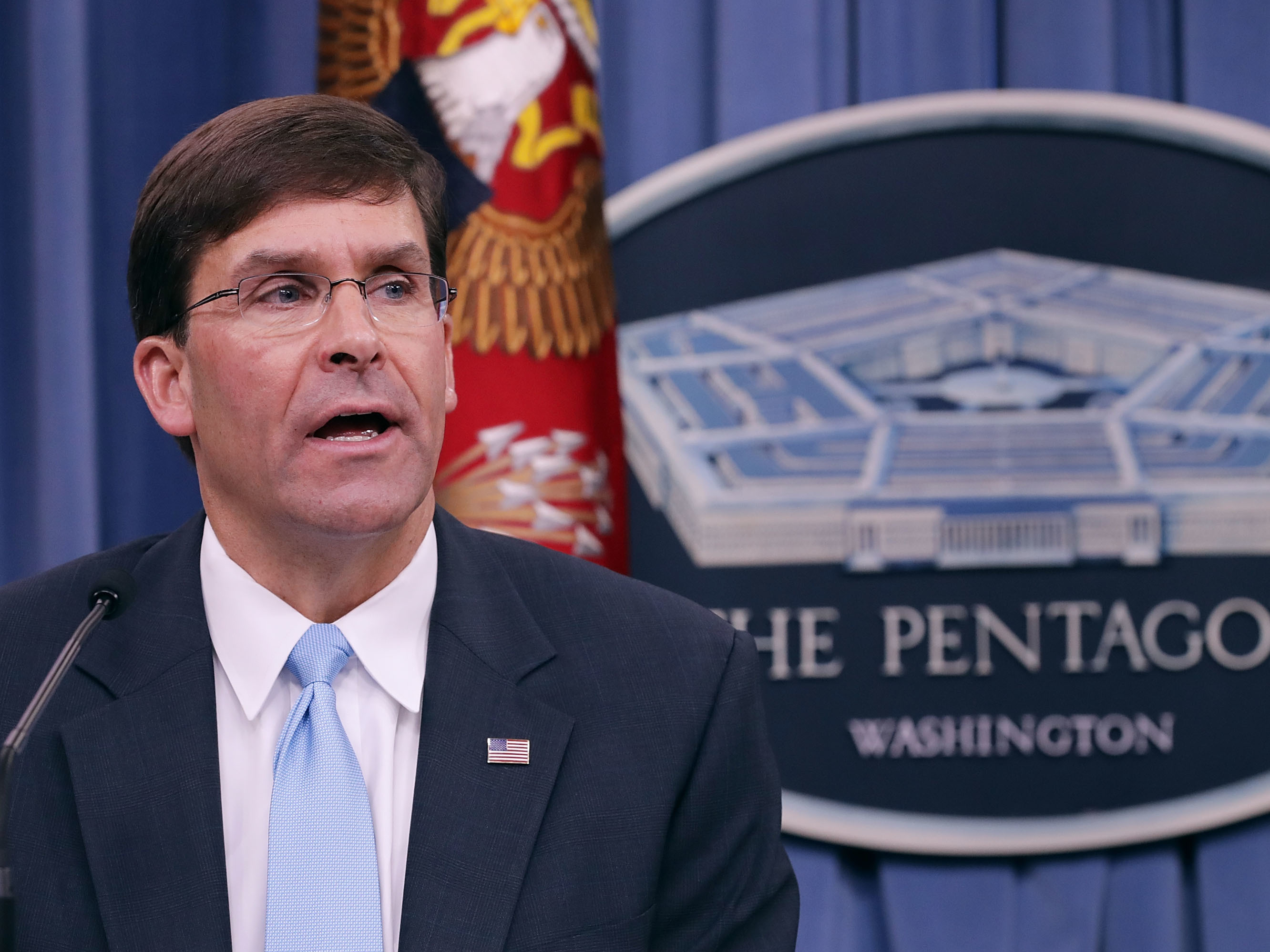 caption: Defense Secretary Mark Esper is re-examining a cloud-computing contract worth up to $10 billion, the Pentagon said Thursday.