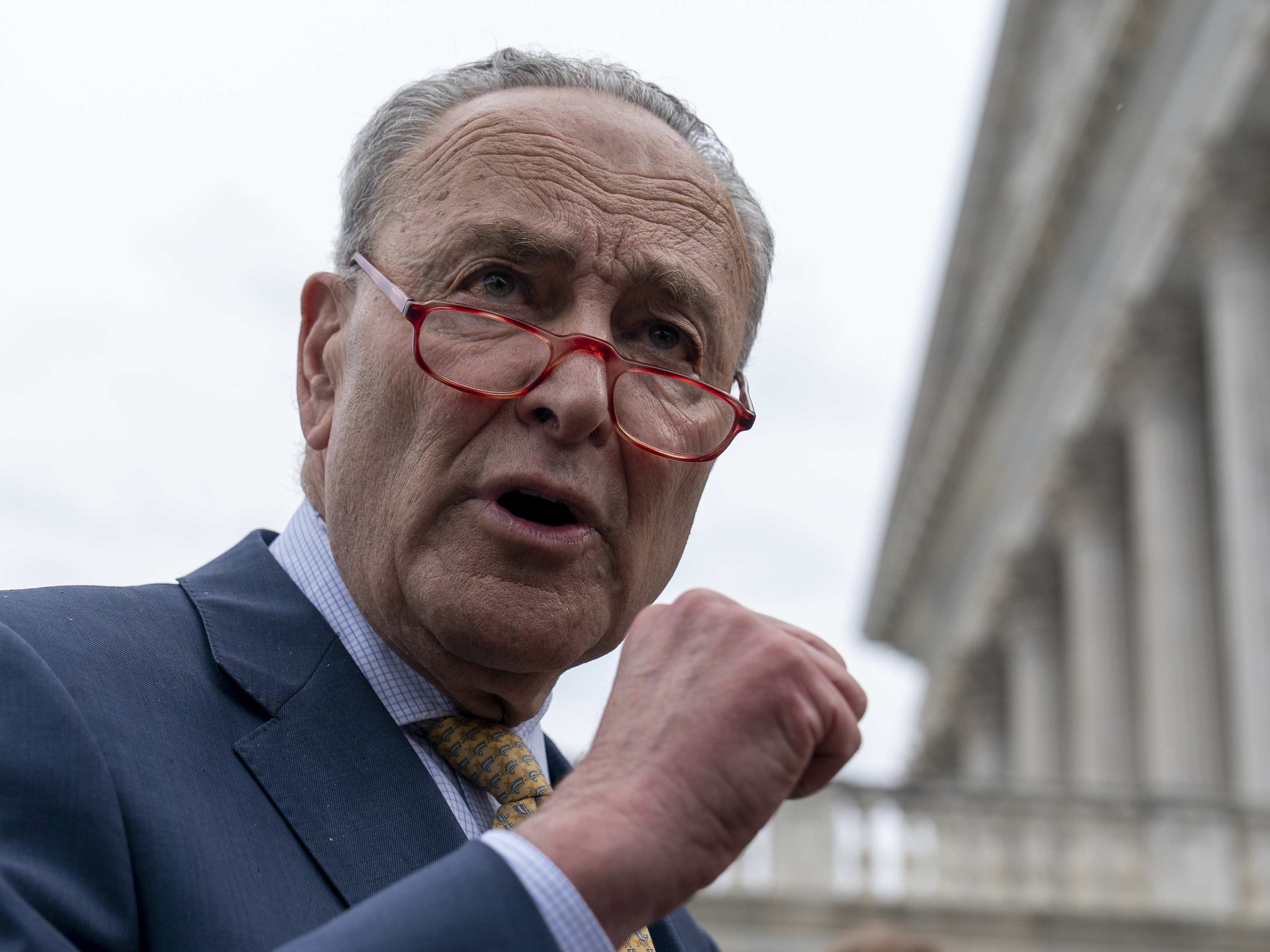 caption: Senate Majority Leader Chuck Schumer of New York speaks with reporters on Capitol Hill on Tuesday.