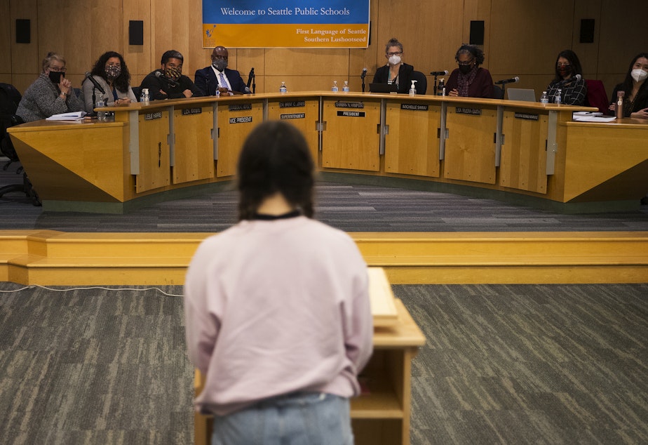 caption: Zirahuen Herrejon-Crutcher, a student at Ballard High School, details her experience with sexual assault and how it was handled by the school district, to the Seattle Public Schools school board, on Wednesday, December 1, 2021, in Seattle. 
