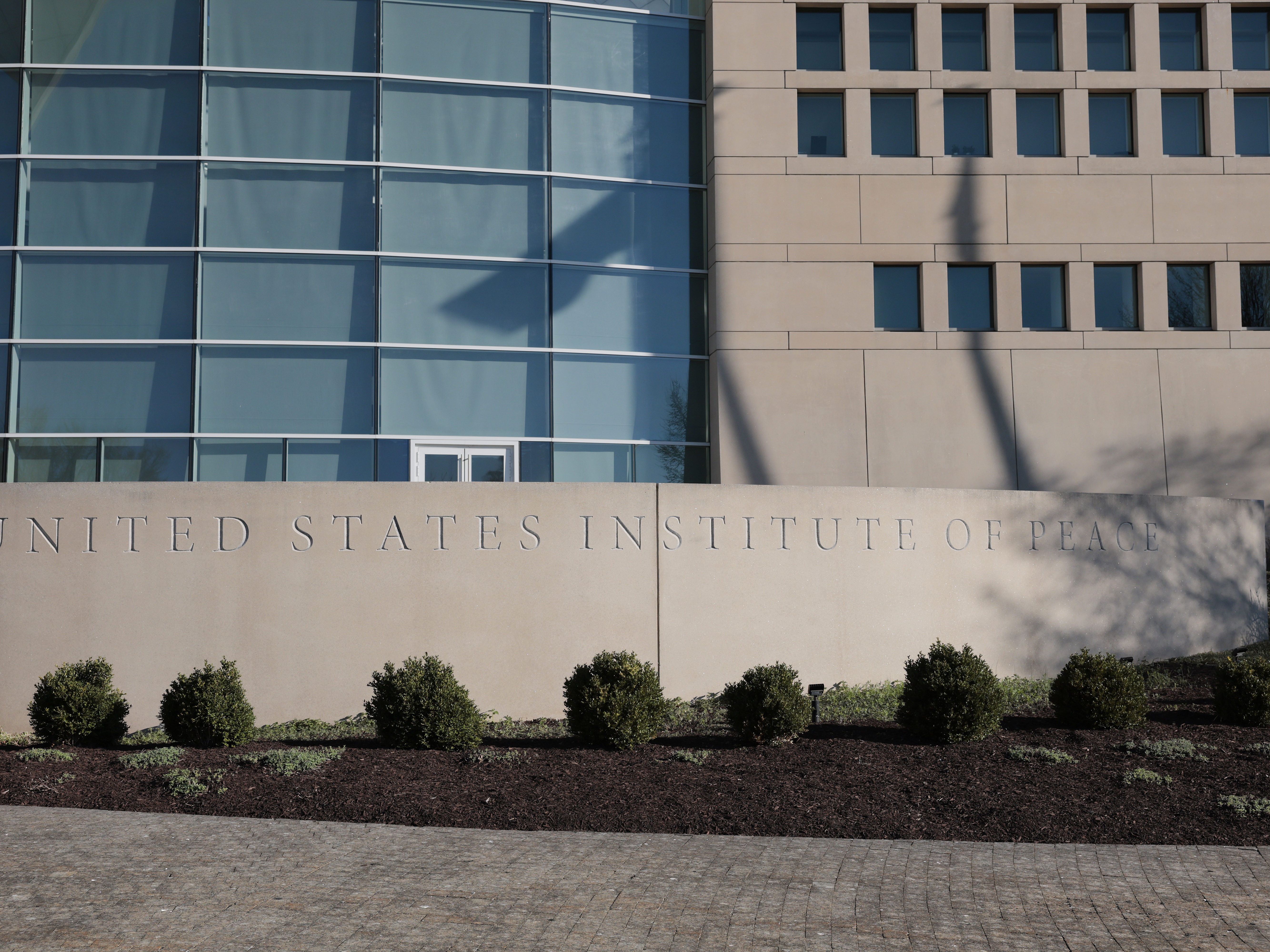 caption: A view of the United States Institute of Peace (USIP) building headquarters on March 18 in Washington, D.C.
