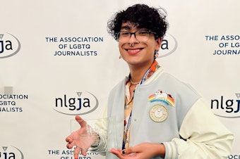 caption: RadioActive's Antonio Nevarez receives the Excellence in Student Journalism Award from NLGJA: The Association of LGBTQ Journalists on Saturday, September 10, 2022 in Chicago, Illinois.