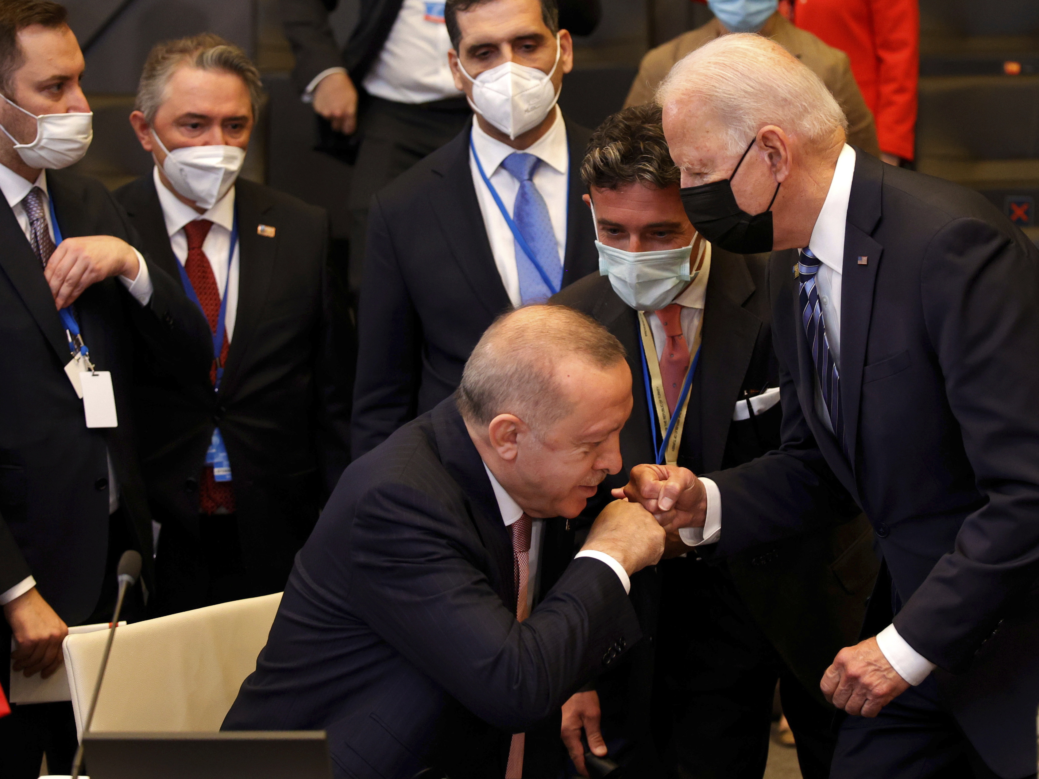 caption: President Biden bumps fists with Turkey's President Recep Tayyip Erdogan at the NATO summit in Brussels. Biden and Erdogan met privately afterward to discuss some thorny issues.