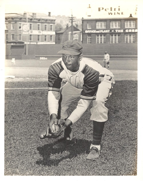 caption: Ulysses Redd played for the Harlem Globe Trotters baseball team, which eventually became the Seattle Steelheads. 