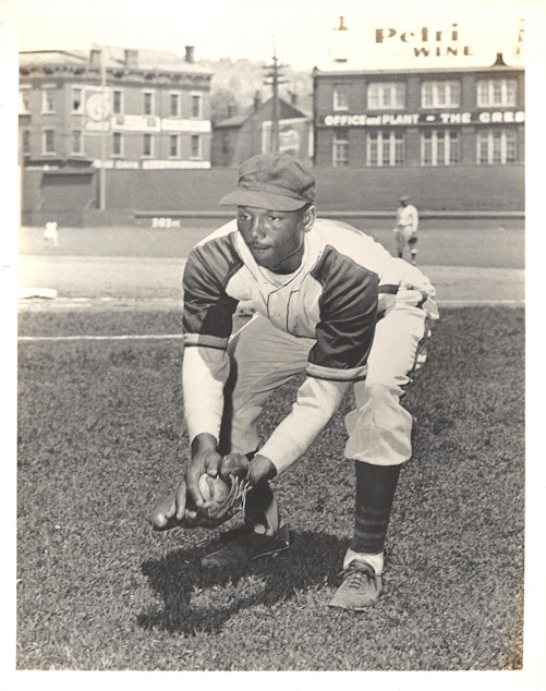 caption: Ulysses Redd played for the Harlem Globe Trotters baseball team, which eventually became the Seattle Steelheads.