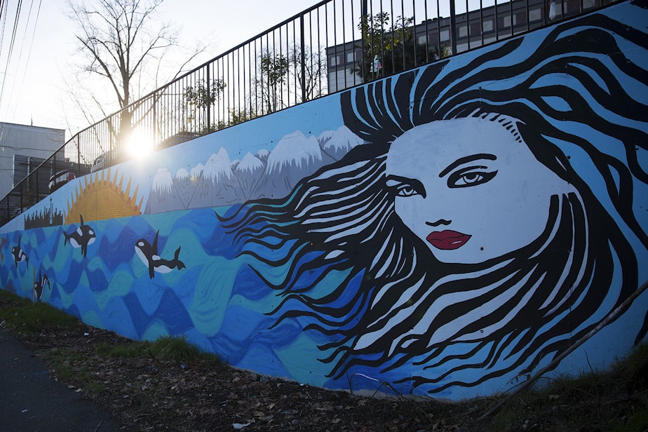 caption: A mural painted by Kendra Azari is shown on Thursday, December 6, 2018, on Lake City Way Northeast in Seattle. 