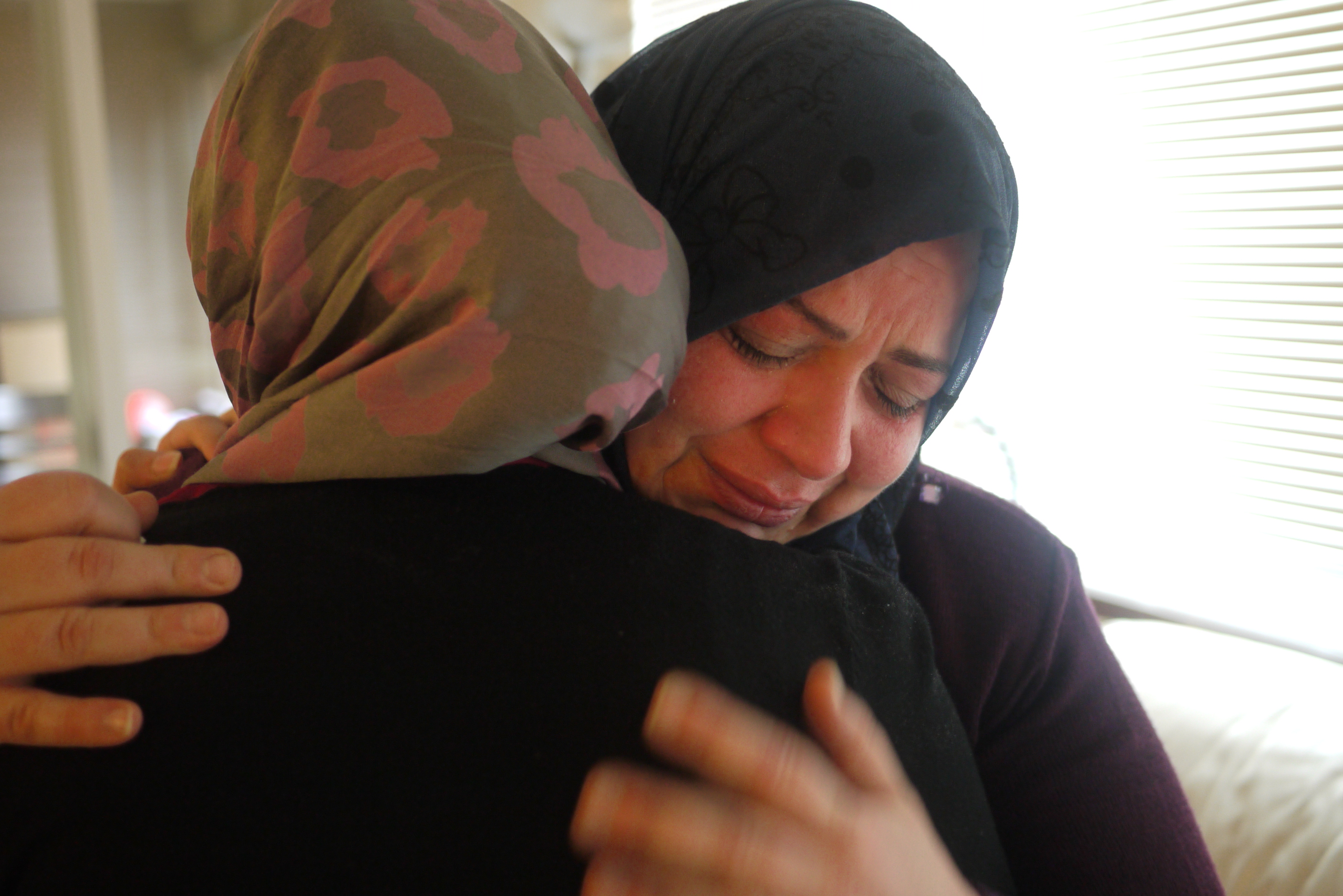 caption: This Syrian mother does not know when her family will be reunited again. Click through for more photos taken by her 11-year-old daughter, Alaa.