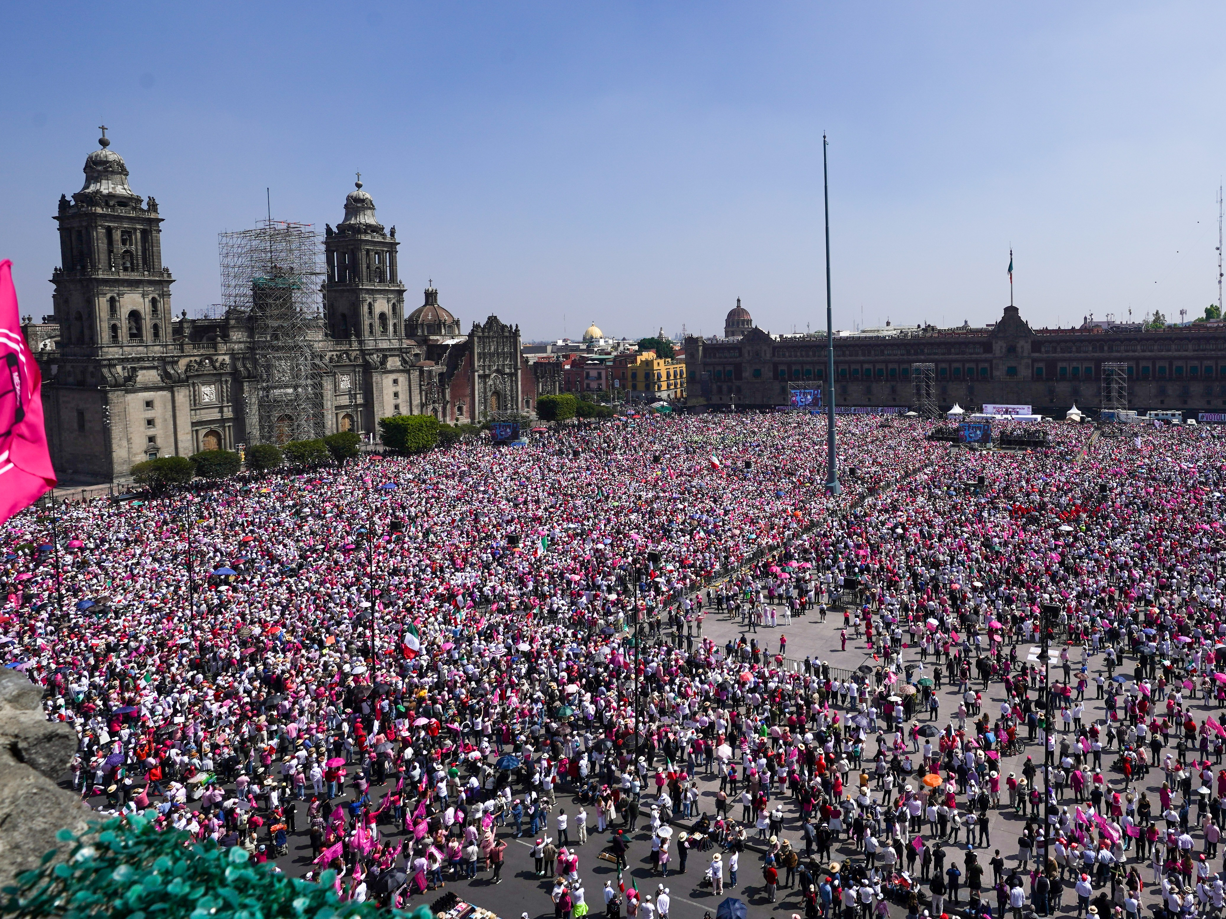 caption: People take parte in a march organized by citizen organizations demanding that electoral autonomy be respected in the upcoming general elections in downtown Mexico City, Sunday, Feb. 18, 2024.