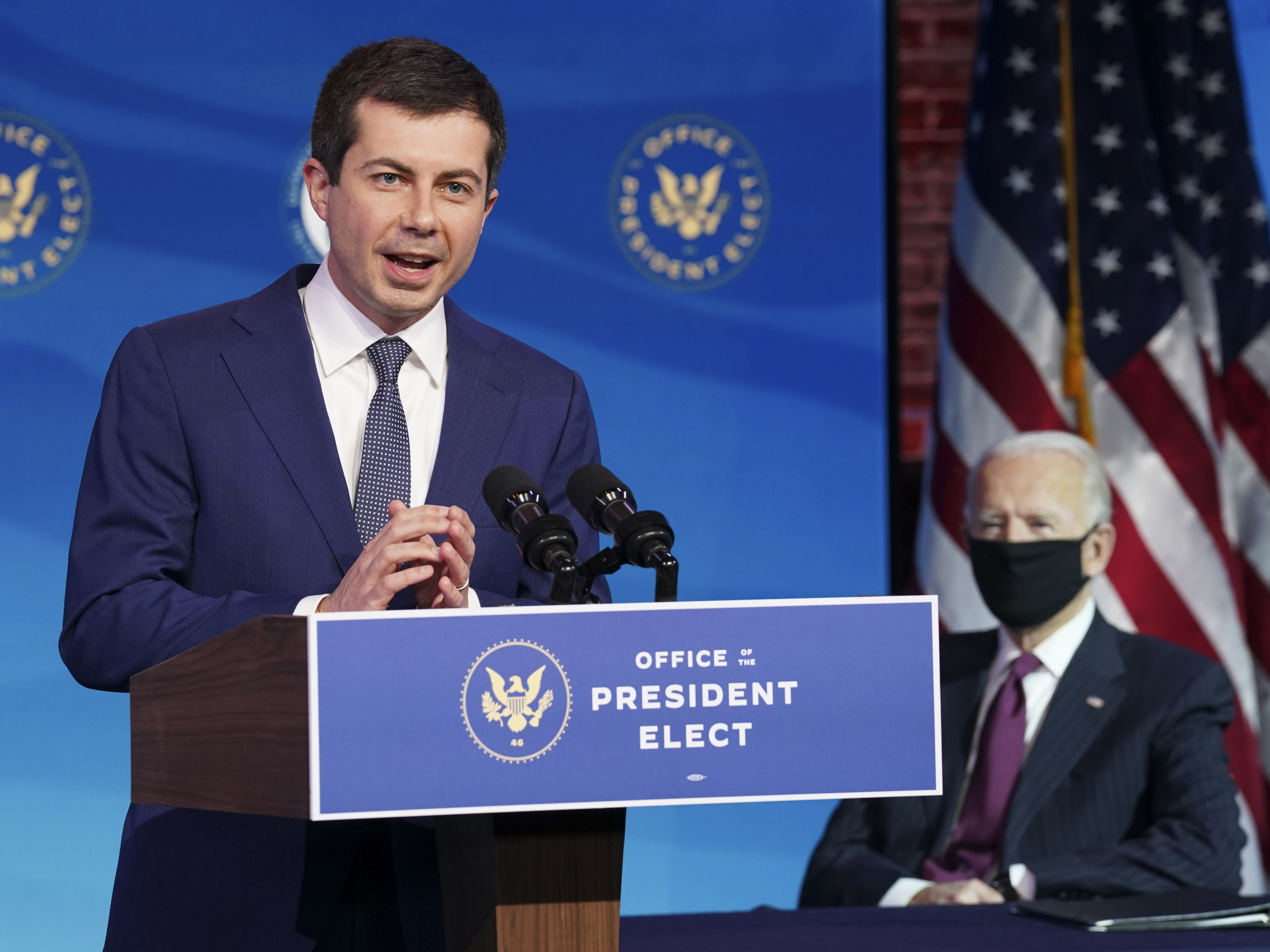 caption: Pete Buttigieg, a former mayor of South Bend, Ind., delivers remarks Wednesday in Wilmington, Del., after he was introduced as President-elect Joe Biden's pick to be secretary of transportation.