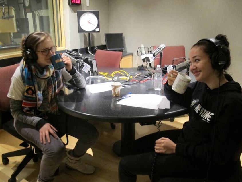 caption: Meghan and Noah have a laugh over tea while recording this podcast.