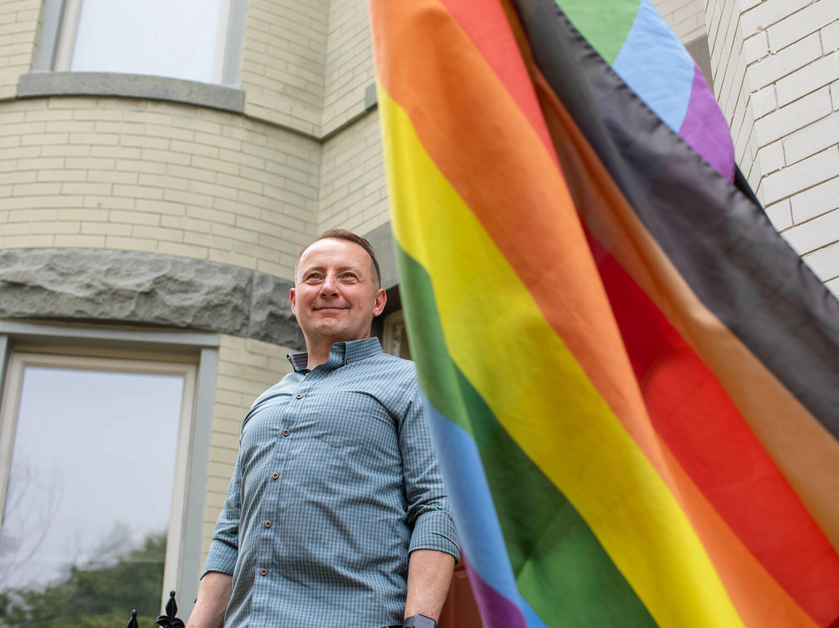 caption: Ret. Lt. Col. Bob Alexander stayed closeted in the Air Force for 20 years because of the "don't ask, don't tell" policy. He came out when the policy ended, and when he retired, he decided to help those who weren't discharged honorably because of their sexual orientation. He resides in Washington D.C., and works as a cybersecurity attorney.