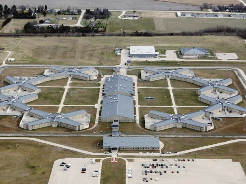 caption: The federal prison complex in Thomson, Ill. (AP Photo/Charles Rex Arbogast, File)