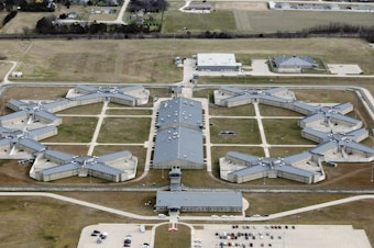 caption: The federal prison complex in Thomson, Ill. (AP Photo/Charles Rex Arbogast, File)